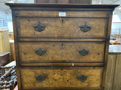 Lot 105 - A reproduction walnut finish chest on chest