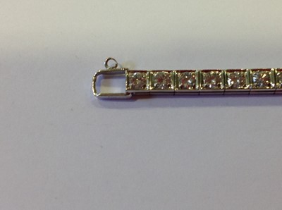 Lot 82 - A diamond line bracelet..