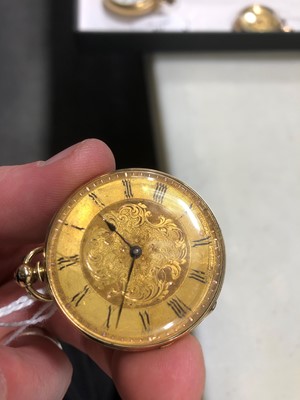 Lot 219 - A small yellow metal open face pocket watch.