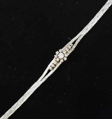 Lot 81 - A diamond set bracelet.