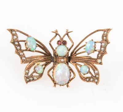 Lot 105 - An opal butterfly pendant.