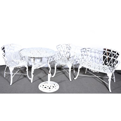 Lot 460 - Four-piece suite of white painted metal garden furniture.