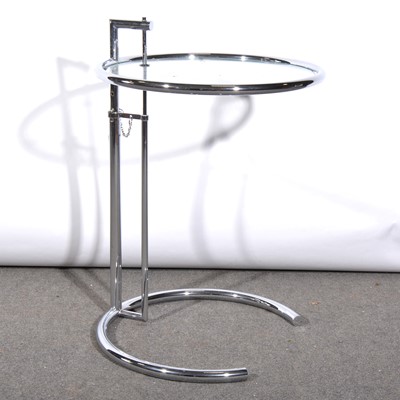 Lot 392 - A chrome and glass adjustable side table, model E1027, after Eileen Gray