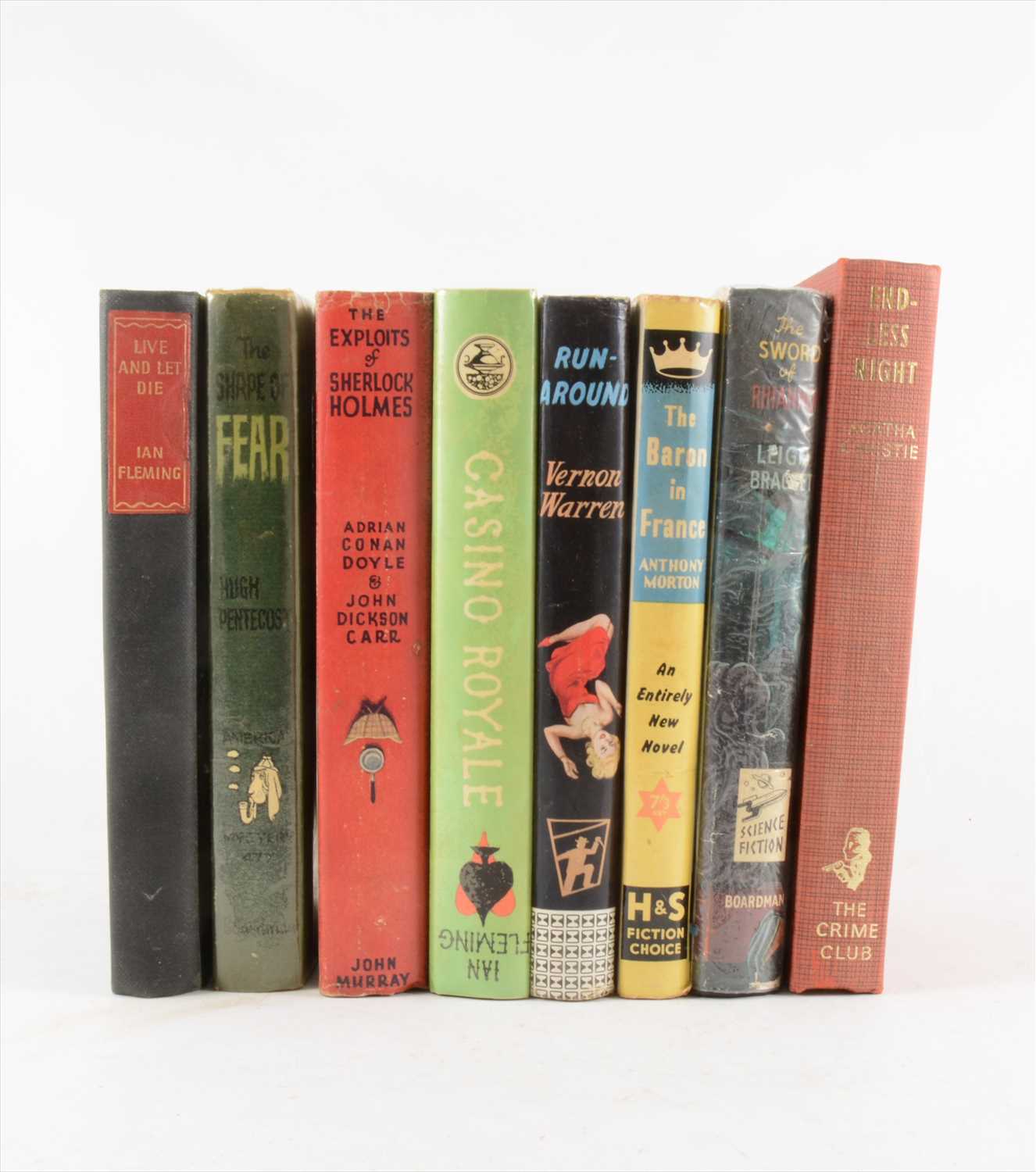 Lot 59 - One tray of books, including Ian Fleming, John Gardner, and other crime/ spy novels