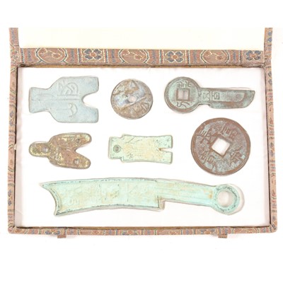 Lot 162 - A collection of seven Chinese archaic style cast metal artefacts