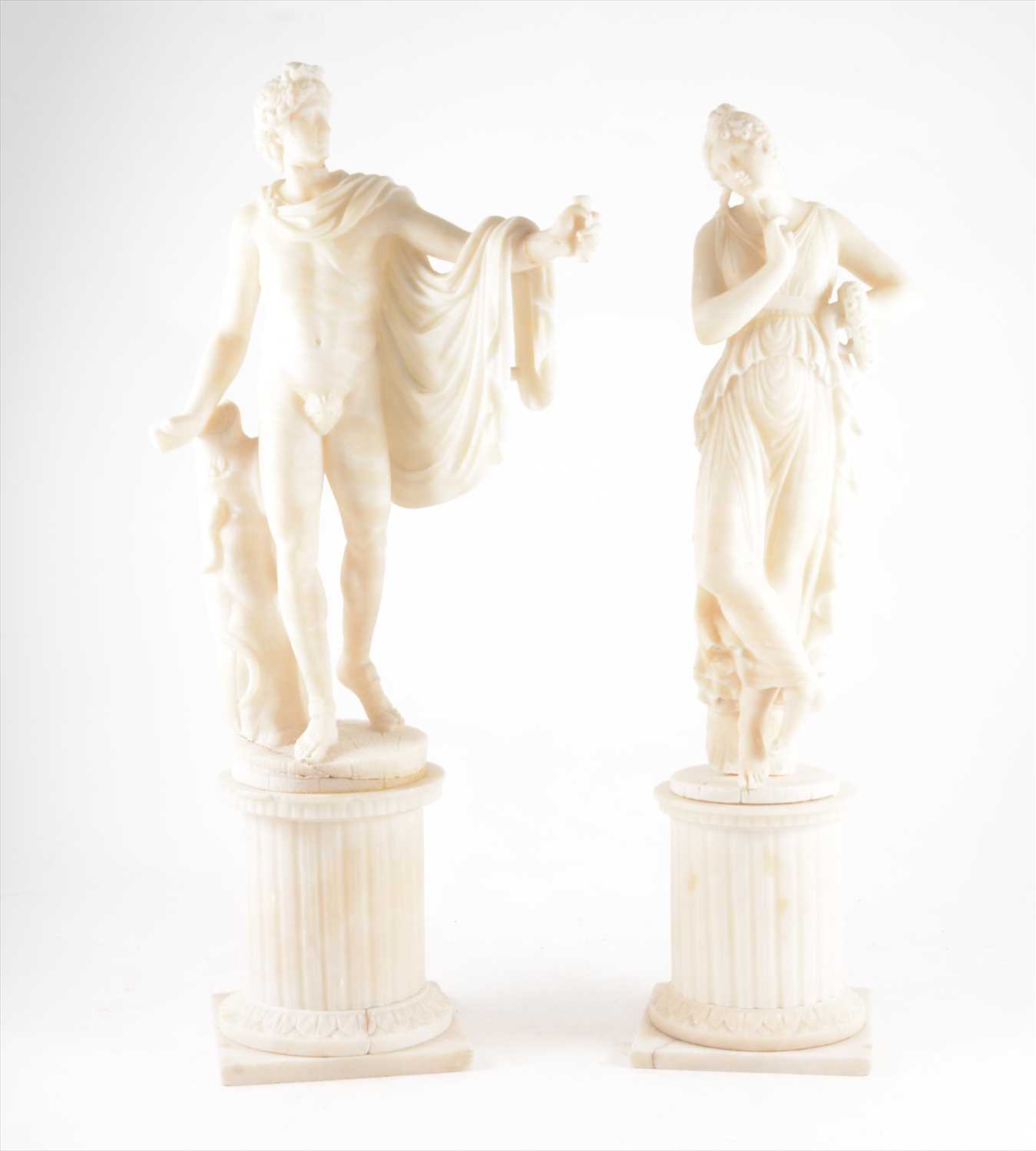 Lot 106 - A pair of alabaster figures Apollo and Flora