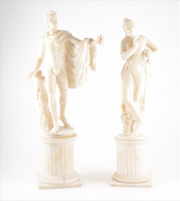 Lot 106 - A pair of alabaster figures Apollo and Flora