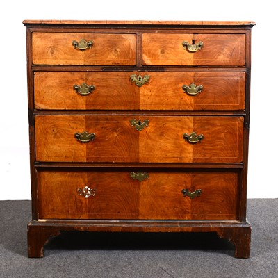 Lot 1542 - A Georgian walnut chest of drawers