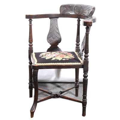 Lot 58 - A Victorian carved oak corner chair