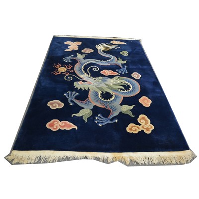 Lot 182 - Chinese carpet, dragon and cloud motif