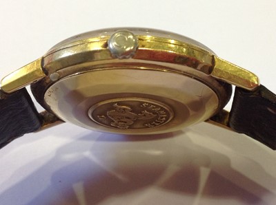 Lot 164 - Omega - a gentleman's Seamaster De Ville yellow metal automatic wrist watch.