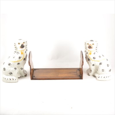 Lot 1107 - A pair of Staffordshire seated King Charles Spaniels, and a Sorrento ware book rack