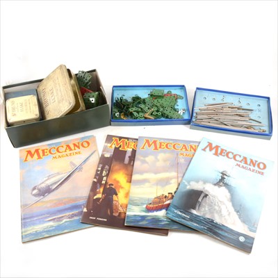 Lot 201 - A quantity of Meccano parts, some boxed and a collection of Pre War and Post War Meccano magazines.