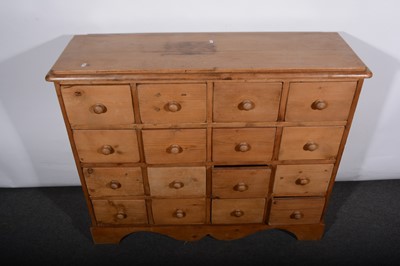 Lot 84 - A pine collectors cabinet