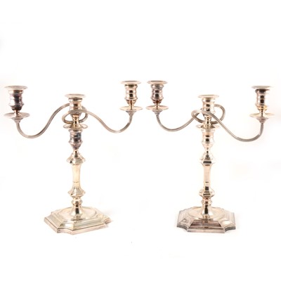 Lot 214 - A pair of Georgian style silver three-light candelabra, Barker Ellis Silver Co, Birmingham, 1988