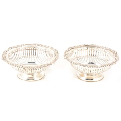 Lot 208 - A pair of silver circular bonbon dishes.