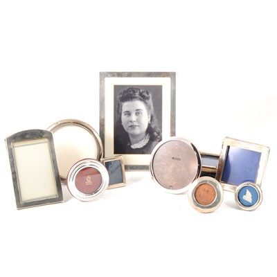 Lot 217 - Ten silver plain photograph frames, rectangular and circular, various sizes.