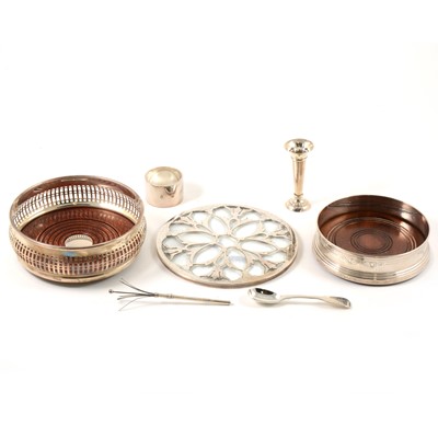 Lot 211 - Two silver bottle coasters, silver mounted glass pot stand, small vase, napkin rings, swizel stick and mustard spoons.