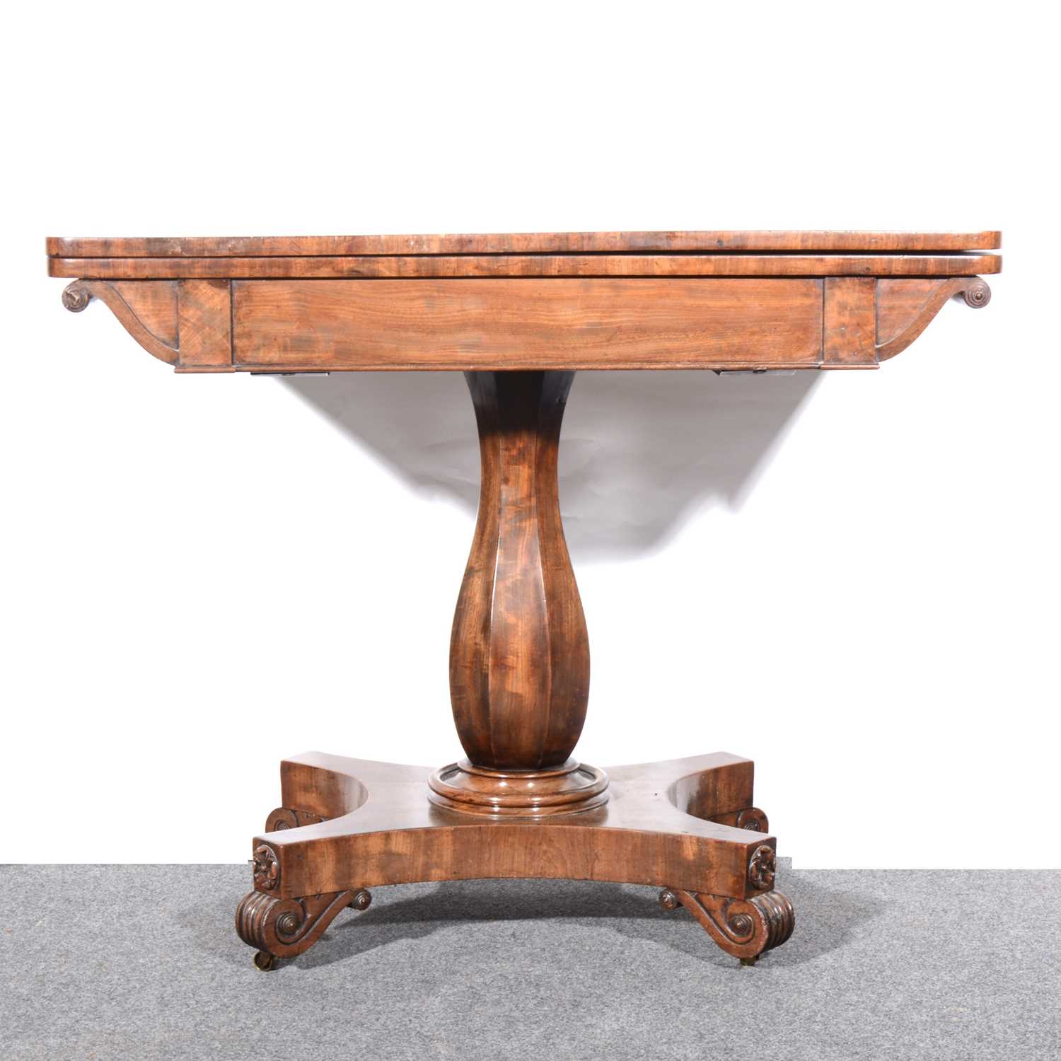 Lot 115 - A William IV mahogany fold-over tea table
