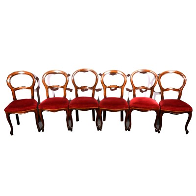 Lot 19 - A set of six Victorian balloon back dining chairs