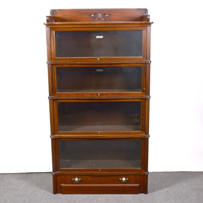 Lot 487 - An American walnut sectional bookcase, The Globe-Wernicke Co Limited