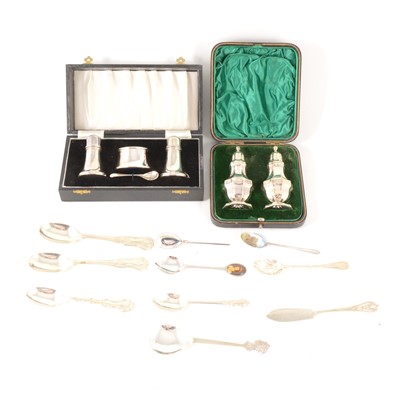 Lot 195 - A boxed silver condiment set. two boxed silver casters, and silver flatware.