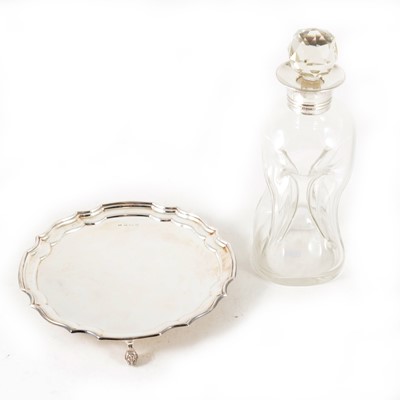 Lot 198 - A silver salver and pinched glass decanter with silver collar.