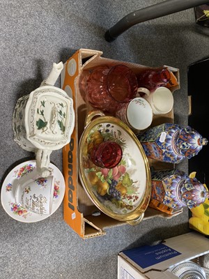 Lot 38 - A collection of decorative ceramics and glassware in two boxes.