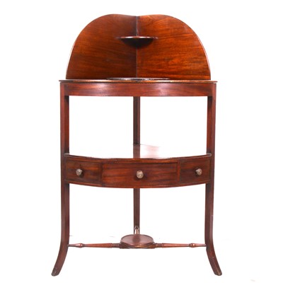 Lot 289 - A mahogany corner washstand.