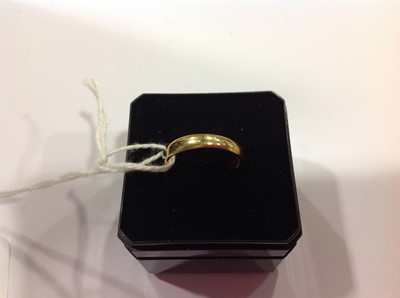 Lot 17 - A diamond set wishbone ring.