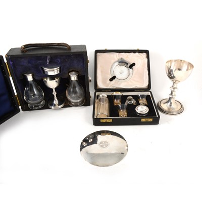 Lot 176 - Two travelling communion sets, one silver, the other plated, and another paten and chalice.