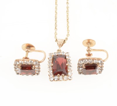 Lot 1240 - A garnet suite of jewellery,  pair of rectangular cluster earrings, pendant and chain.