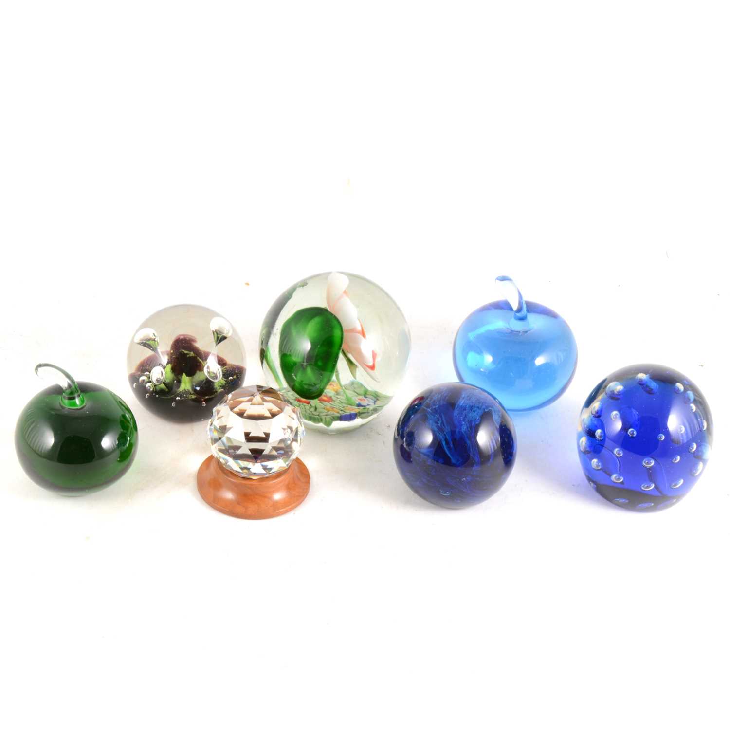 Lot 24 - A collection of glass paperweights