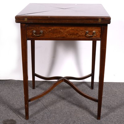 Lot 526 - An Edwardian mahogany envelope-top card table