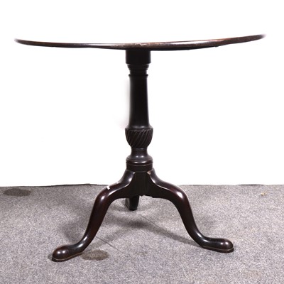 Lot 1520 - A mahogany tilt-top table, 19th century