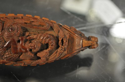 Lot 75 - A carved coquilla nut snuff box, designed as the French ship-of-the-line Victoire