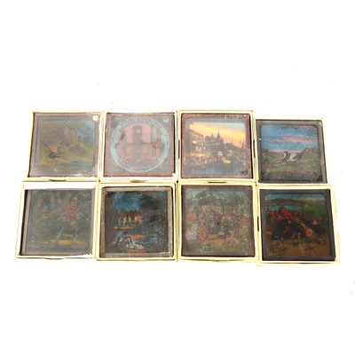 Lot 182 - Sixteen coloured magic lantern slides, in a tin box