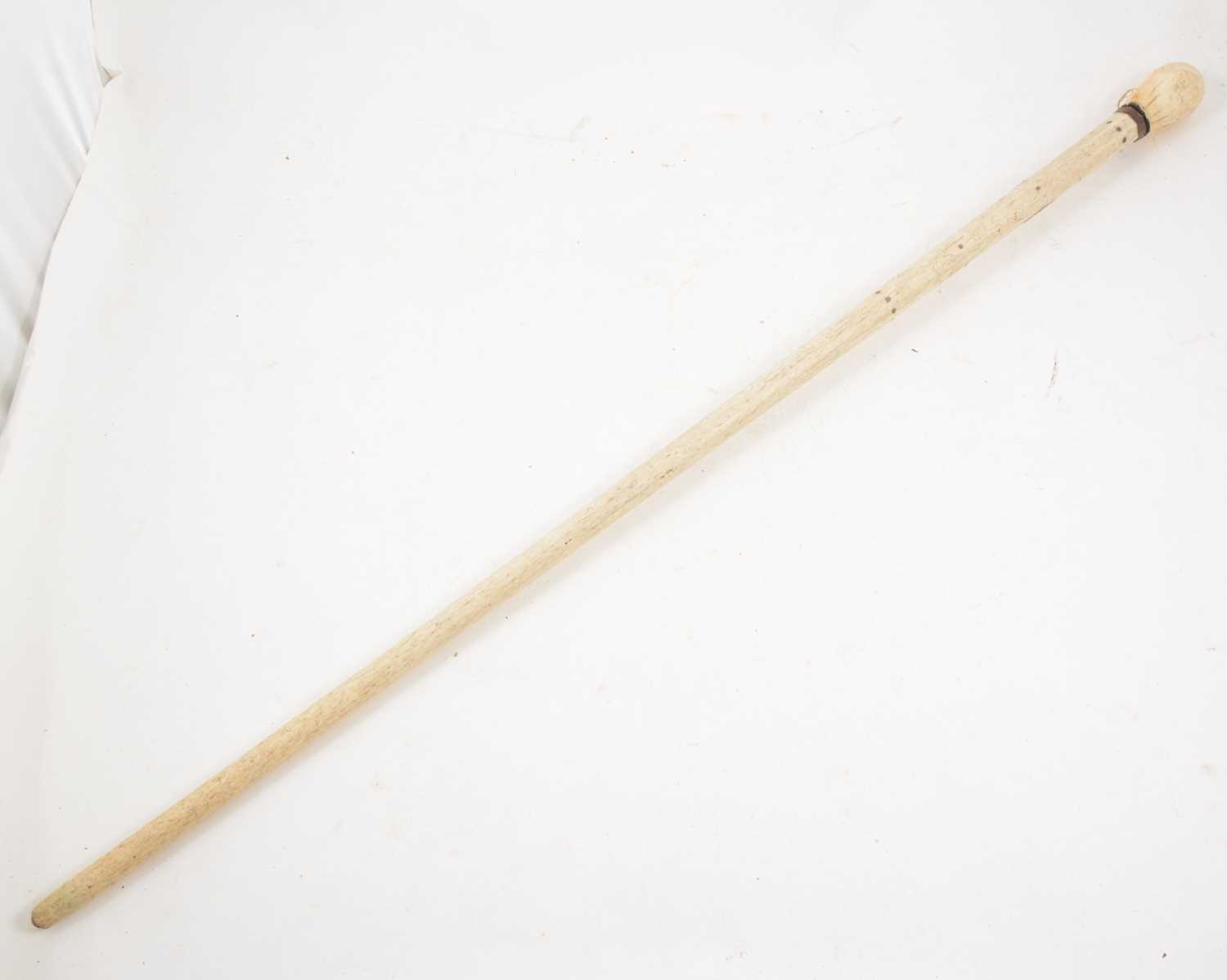 Lot 1148 - A walking stick fashioned from whalebone