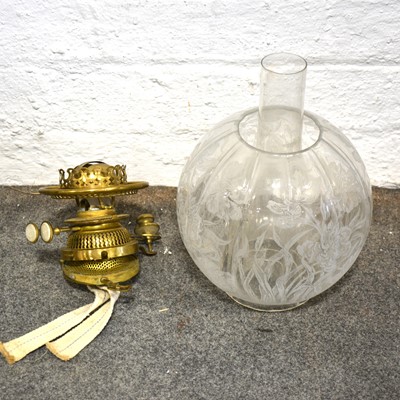 Lot 1493 - A brass oil lamp with porcelain panelled column