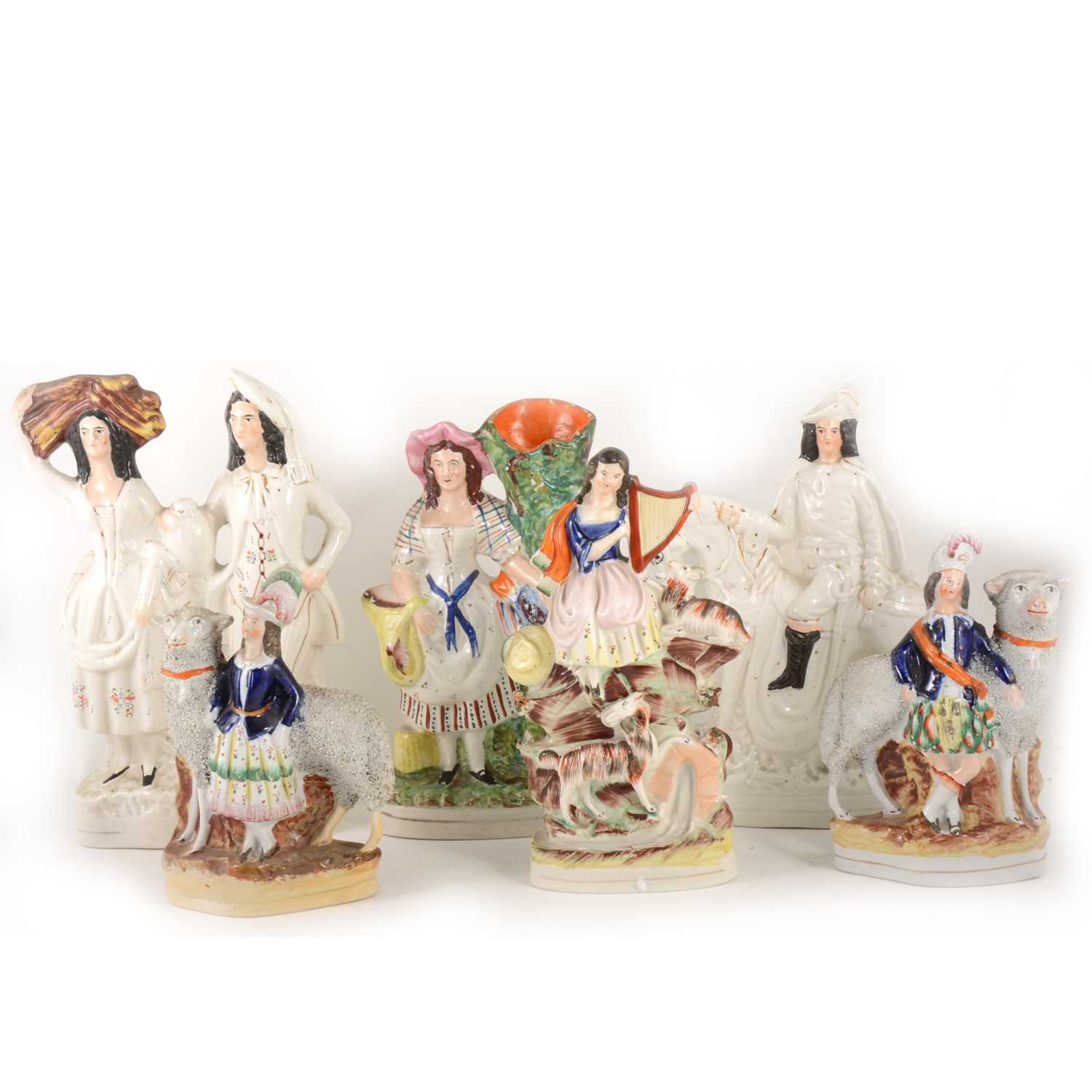 Lot 1006 - Six various Staffordshire pottery figures