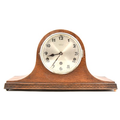 Lot 233 - A 1940s oak mantel clock