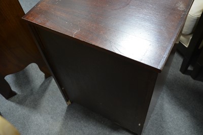 Lot 53 - A stained wood music cabinet