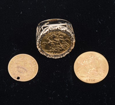 Lot 1322 - A George V gold half Sovereign, mounted as a ring, another half Sovereign and a Napoleon III 5 Francs 1860.