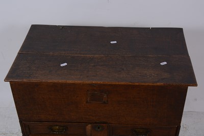 Lot 99 - A boarded oak bible box on stand