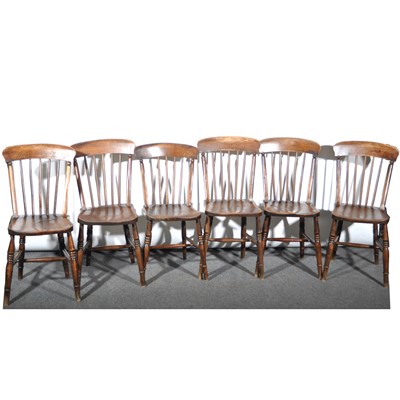 Lot 596 - Set of six elm and beechwood lathe-back kitchen chairs