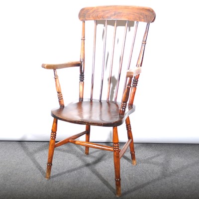 Lot 603 - An elm and beechwood lathe-back kitchen chair