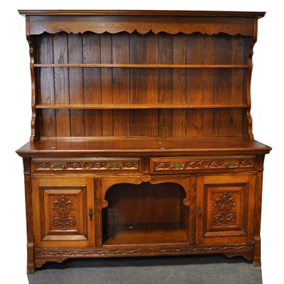 Lot 630 - Late Victorian carved oak sideboard