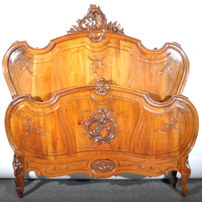 Lot 627 - French carved walnut bedstead