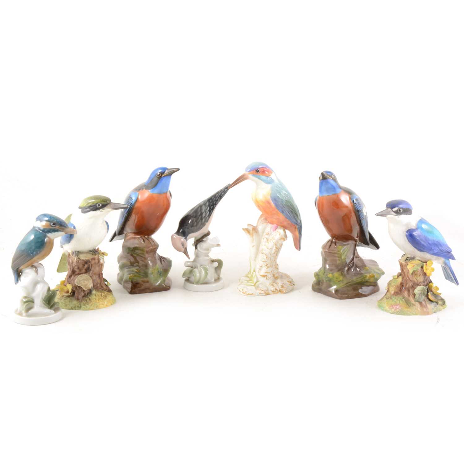 Lot 5 - A collection of ceramic Kingfisher figures, and other birds