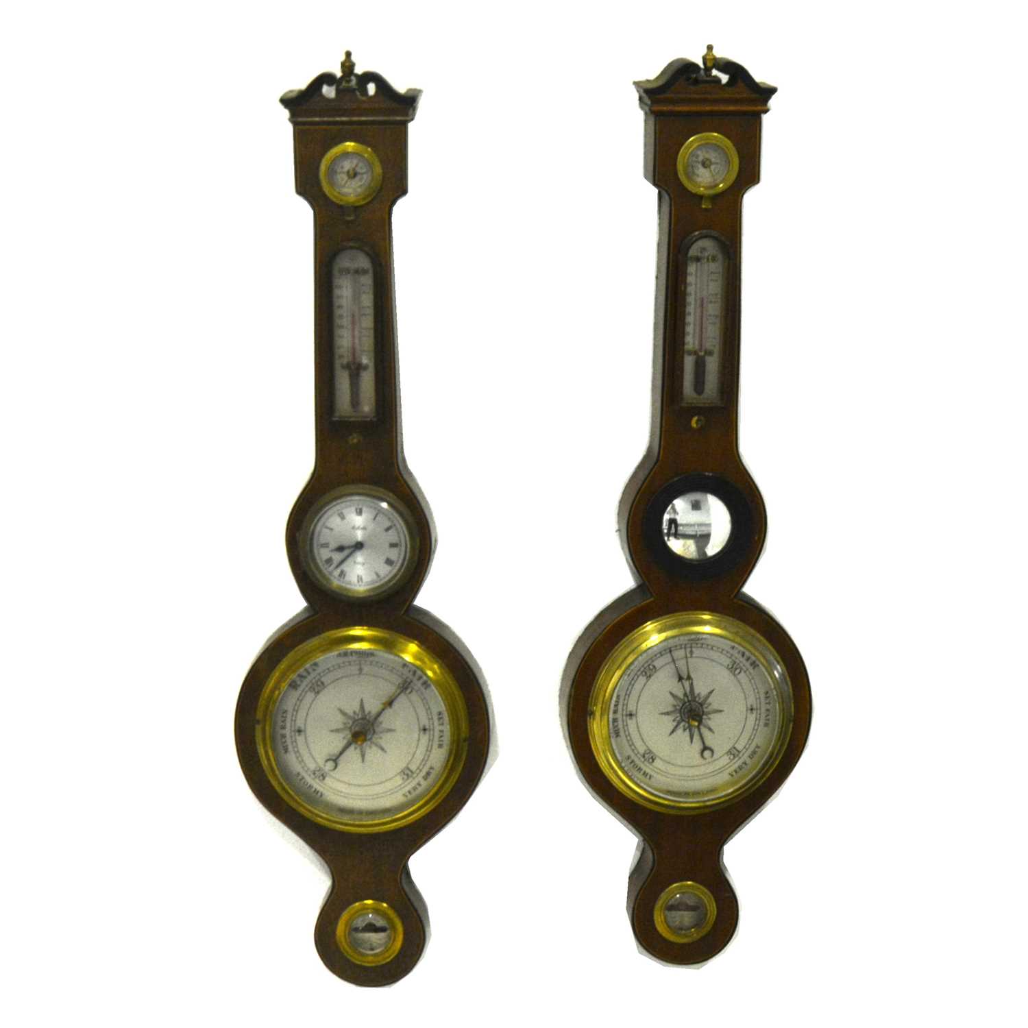 Lot 152 - A small mahogany banjo shape wall barometer, and a similar barometer